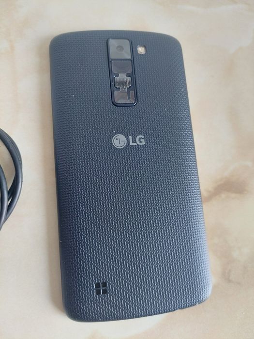Vând LG K8 4G impecabil [codat orange] + încărcător //poze reale