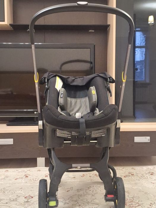 Коляска  DOONA  Б/у