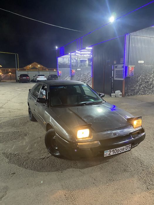 СРОЧНО продаётся Мазда 323.На ходу
