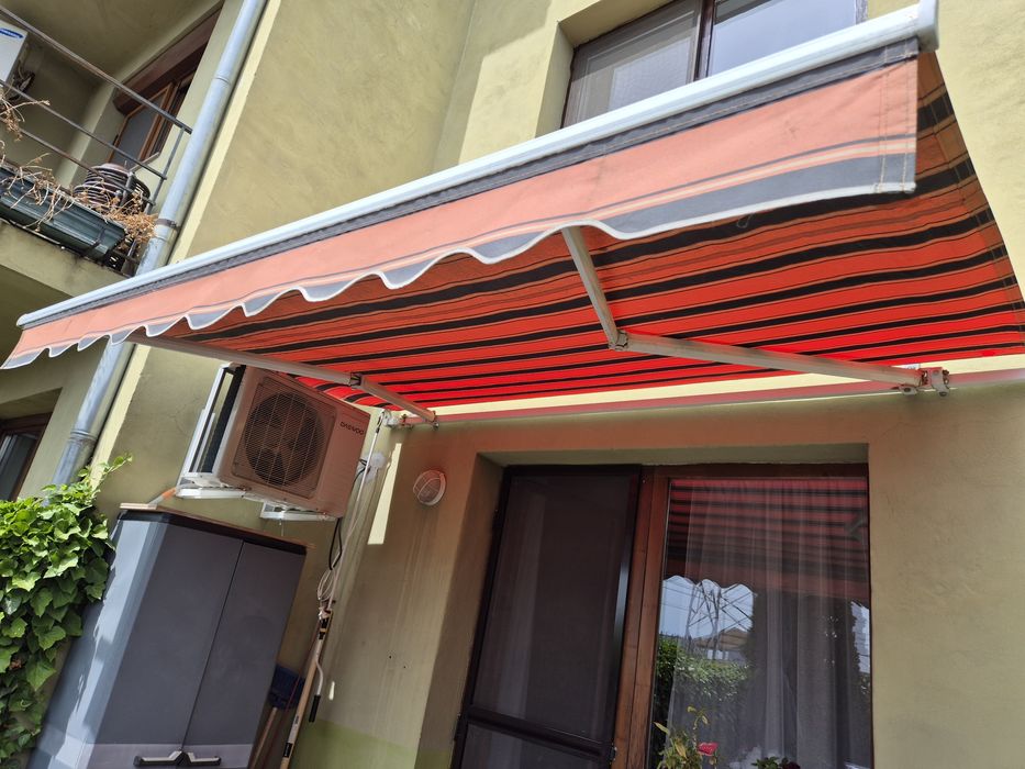 Copertină retractabilă
