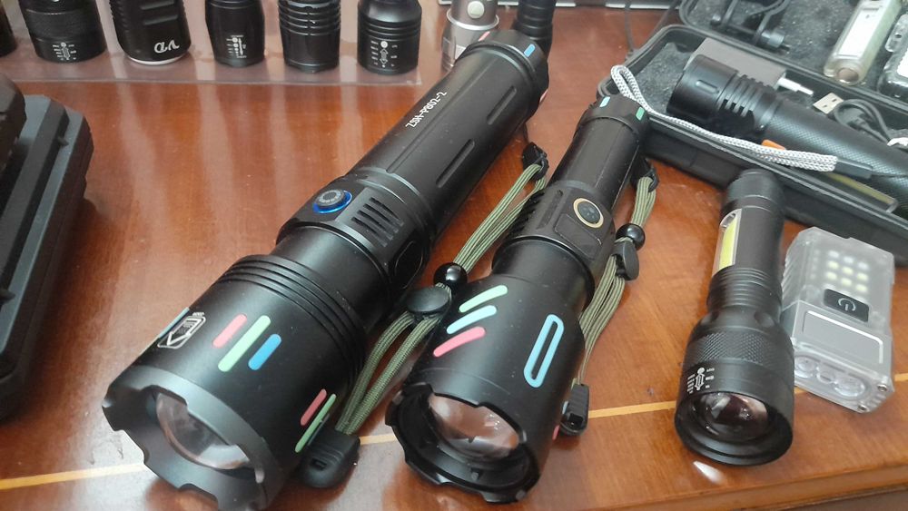 Lanterne , proiectoare puternice zoom acumulator raza 100-900metri