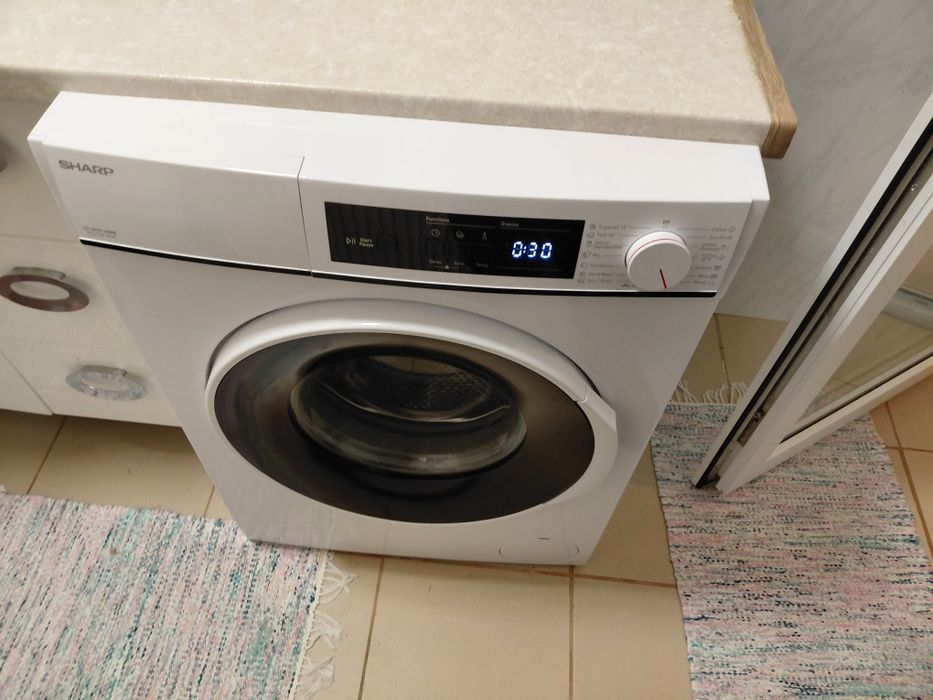 Masina de spalat rufe Sharp 7 kg 1400 rp are 1an si ceva