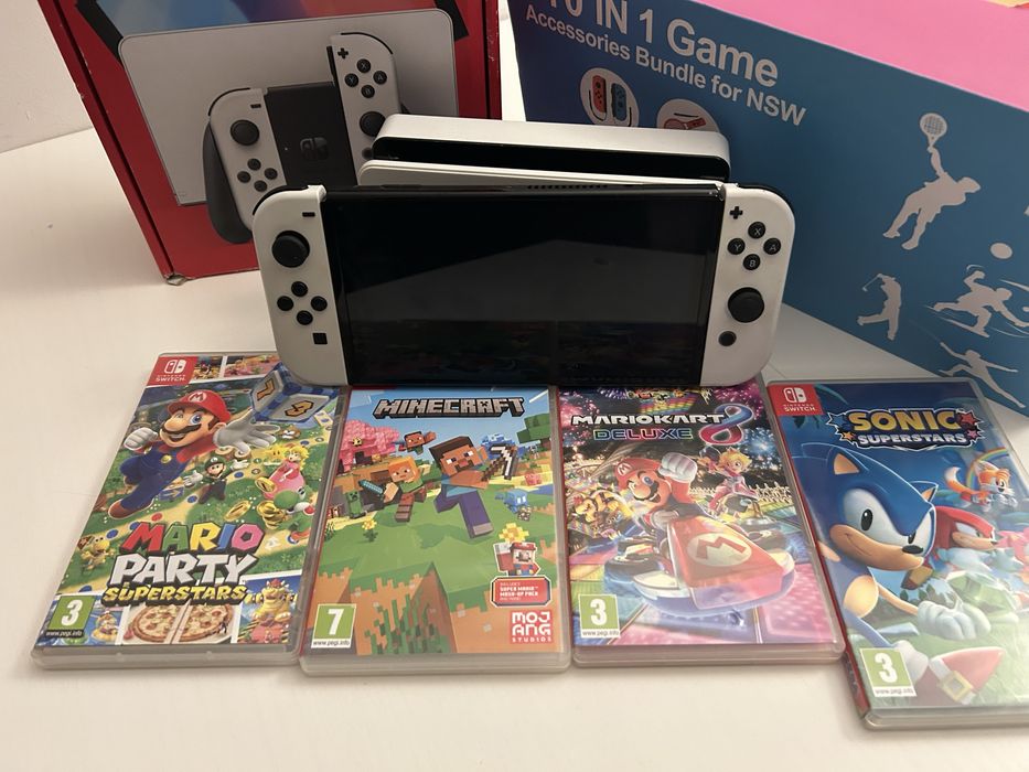 Nintendo Switch OLED + 4 jocuri + accesorii | aproape nou
