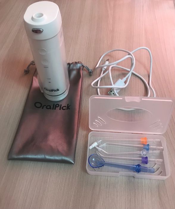 Ирригатор Oralpick новый