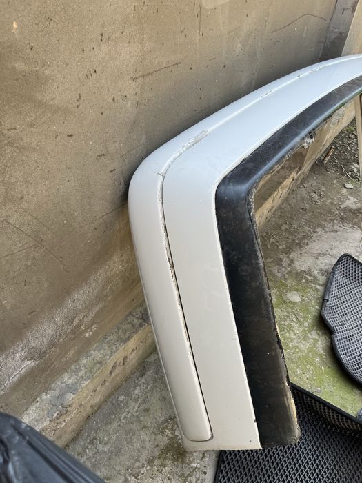 Оригинал бампер 210 до рест