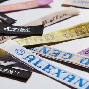 Jakkard toʻqima etiketlar karton birkalar emblema reklama hizmati