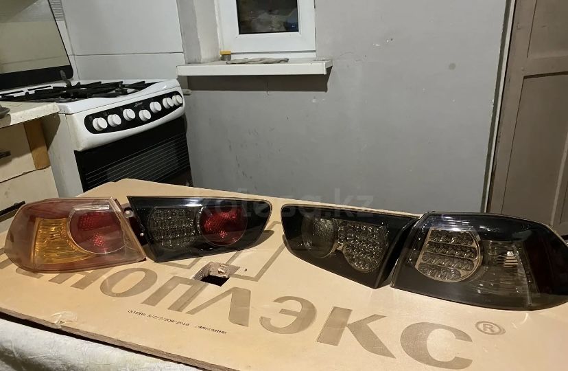 Задние фонари лансер 10