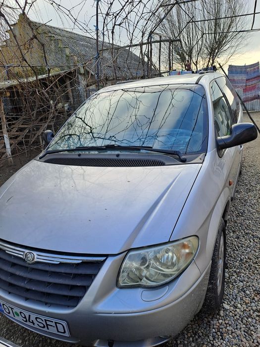 Vînd Chrysler Grand Voyager