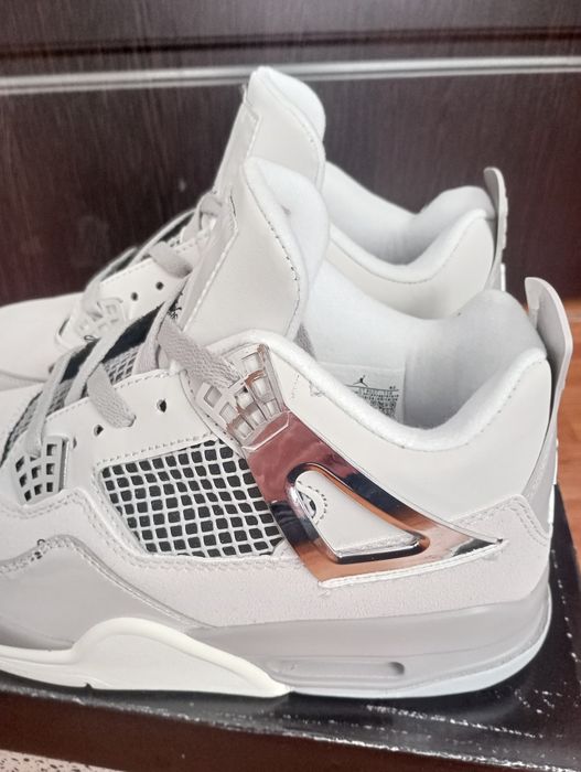 Jordan 4 Frozen Moments