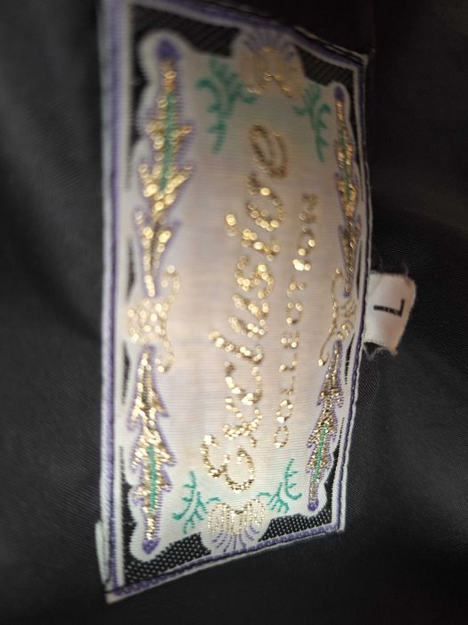 Haina confectionata din blana naturala de nutrie,  trei sferturi