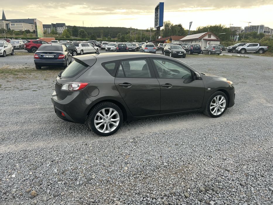 Mazda 3 1,6 benzina 105 cp 2010
