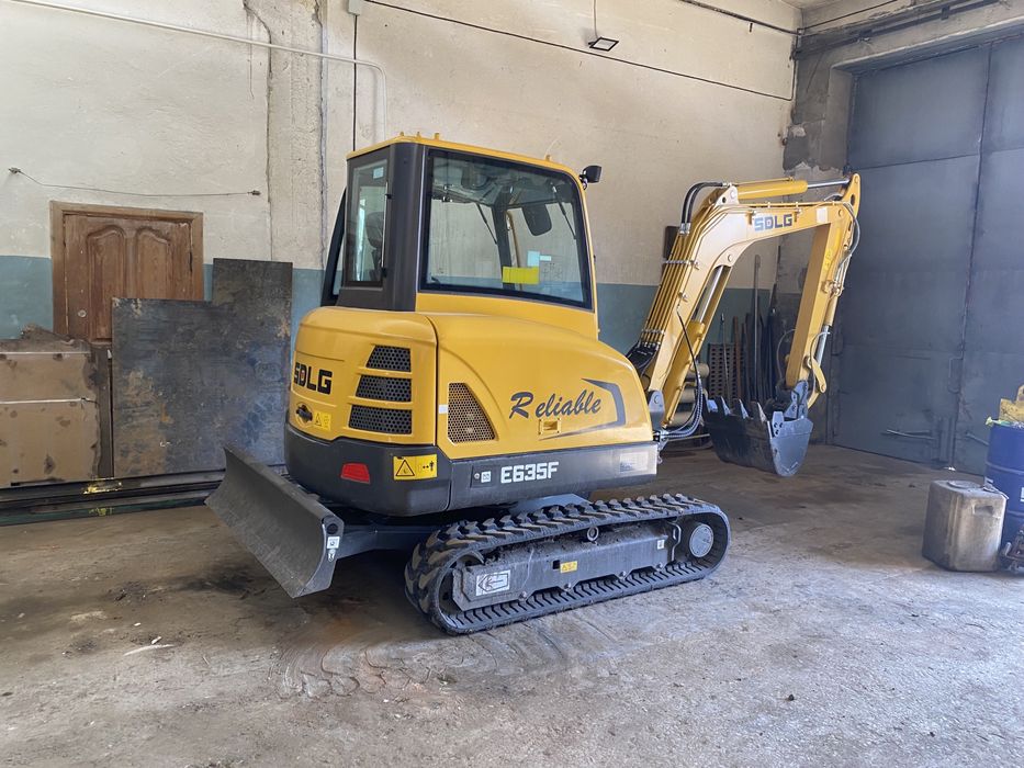 Мини-экскаватор, гидромолот