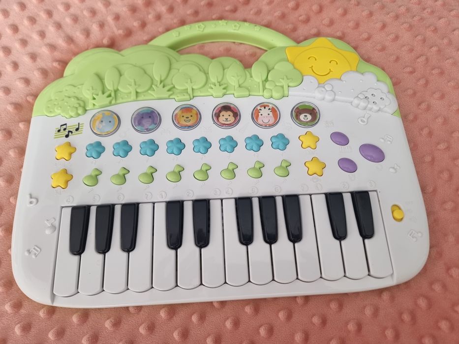 Jucarie în perfecta stare de funcționare cu sunete, cantece și animale