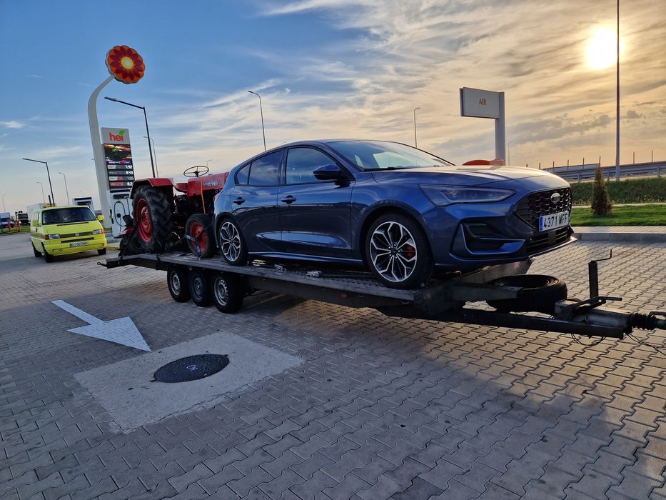 Tractari auto transport Romania Spania pe platforma dube utilaje