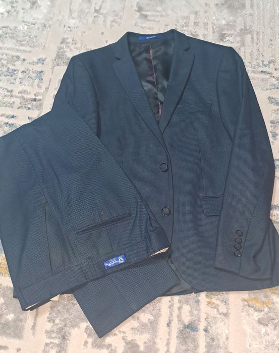 Kastyum shim. 2-3 marta kiyilgan.