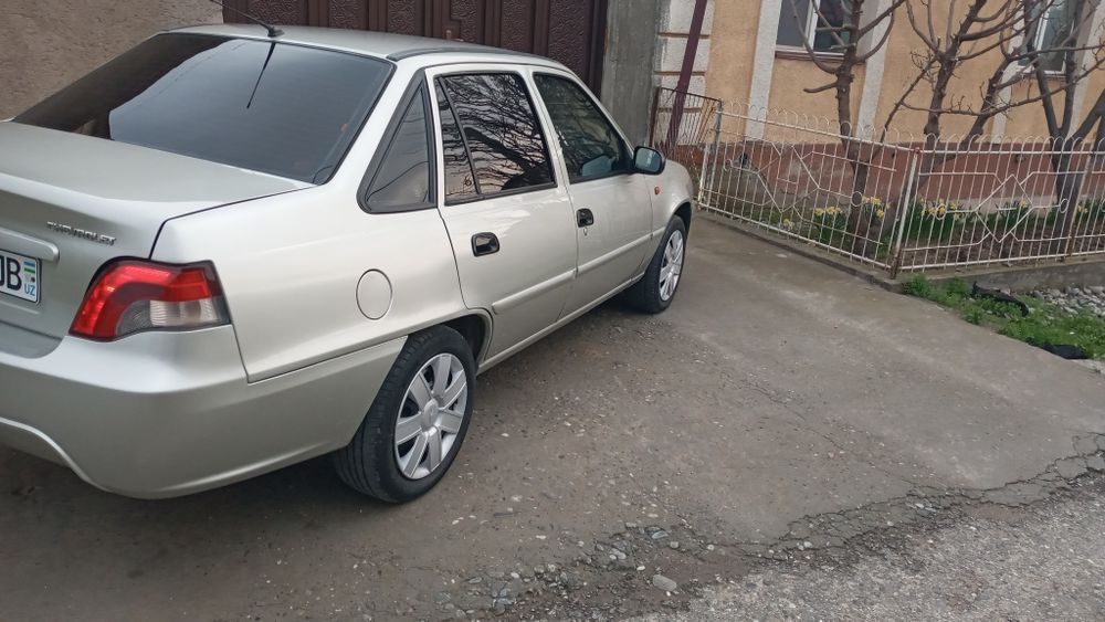 Nexia 2 2009 yaxshi minilgan mashina