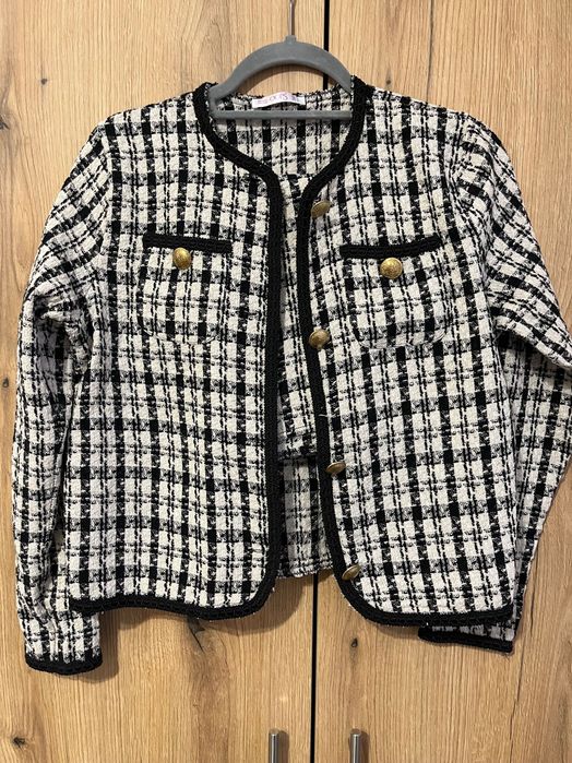 Дамски пуловери и рокли