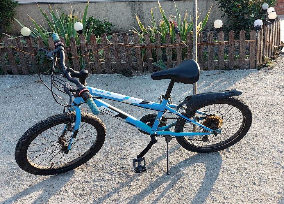 Vând bicicleta copii 9 -12 ani