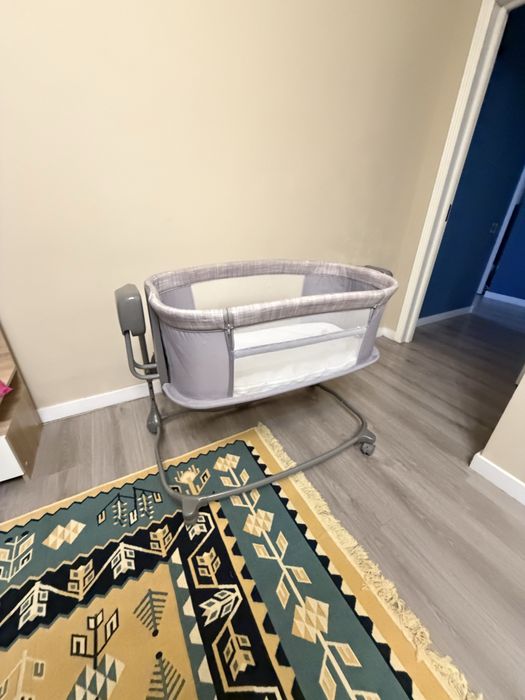 Манеж-качалка электрическая