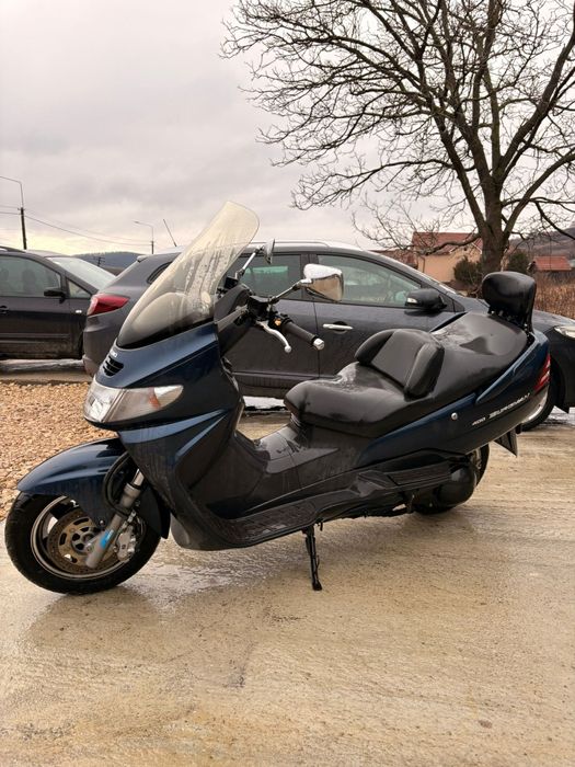 Suzuki burgman 400cc vând întreg sau dezmembrez