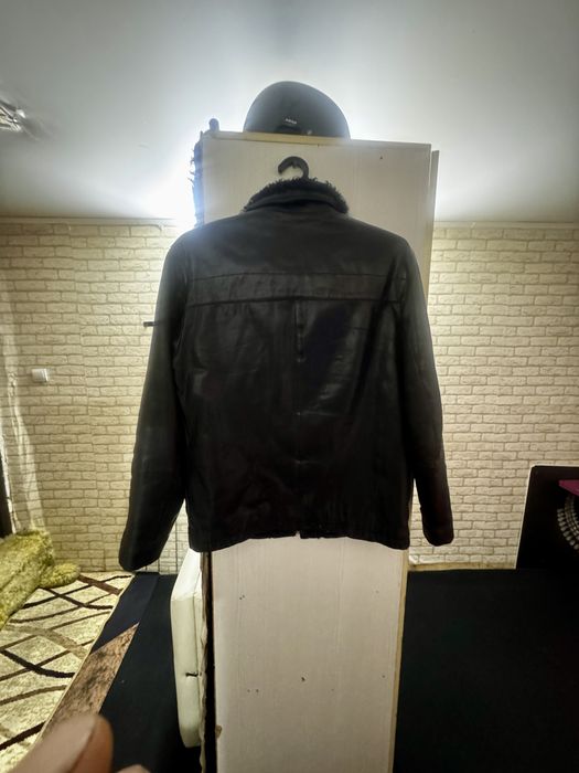 Кожанная куртка с каракулем