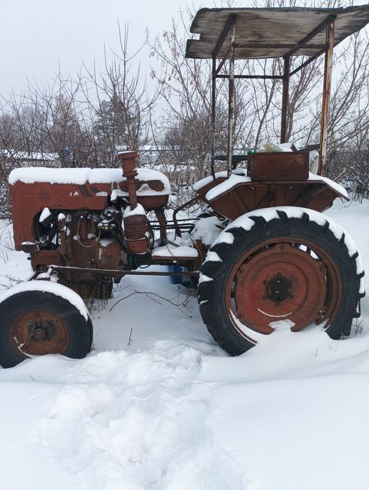 Продам трактор Вместе с телегой, с запчастями