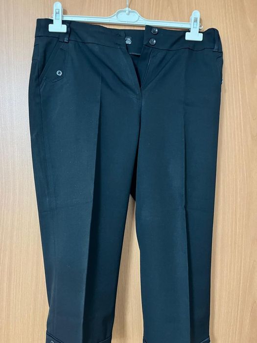 Женские брюки и брюки- Капри