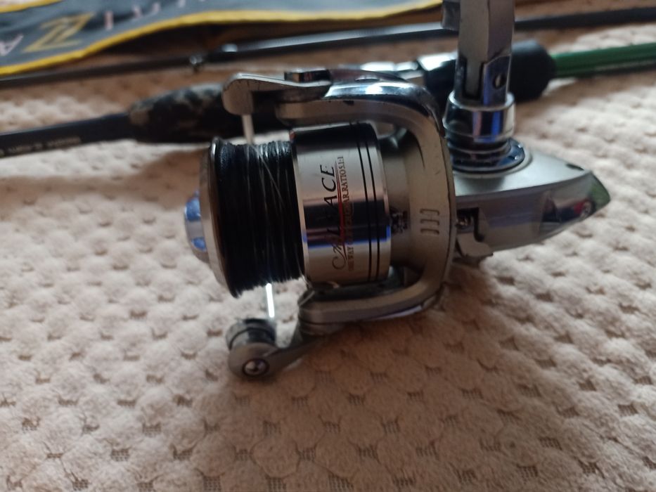 Продам спининг вместе с катушкой