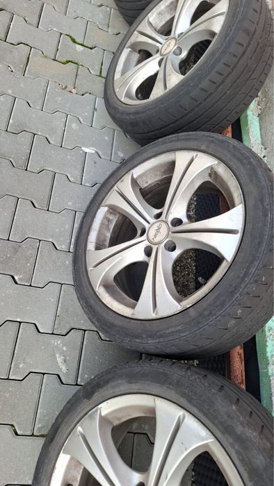Set jante aliaj cu gume de vară uzate