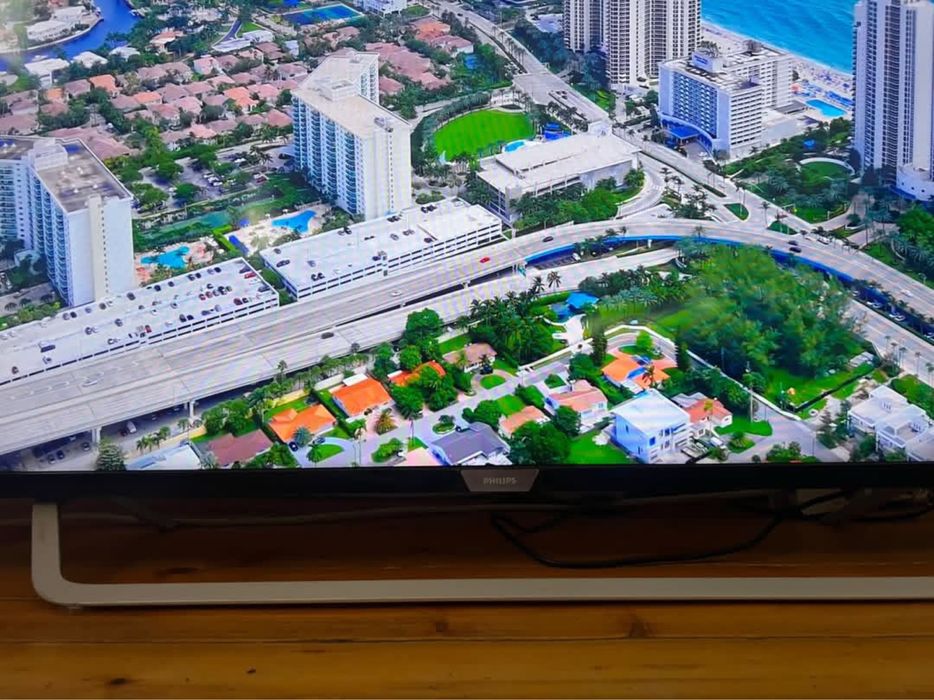 Philips 65” 4K UHD Smart TV, Ambilight