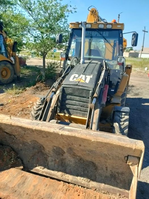 Продаю экскаватор-погрузчик CAT432D