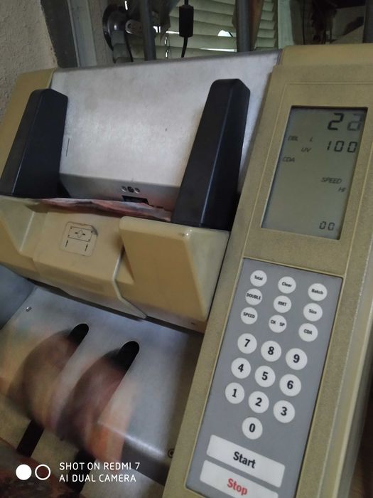 счетная машинка для денег делару