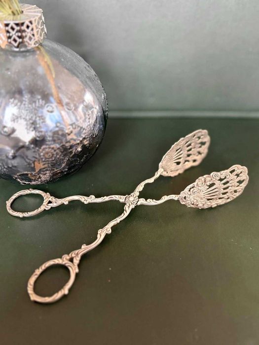 Clește vechi din argint,