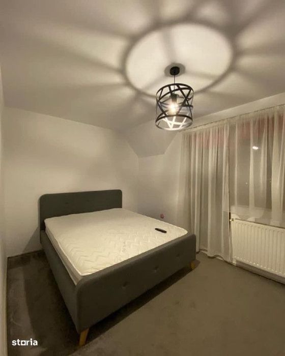 Apartament de vanzare cu 3 camere pe 2 nivele cu foisor si garaj — fotografia 1
