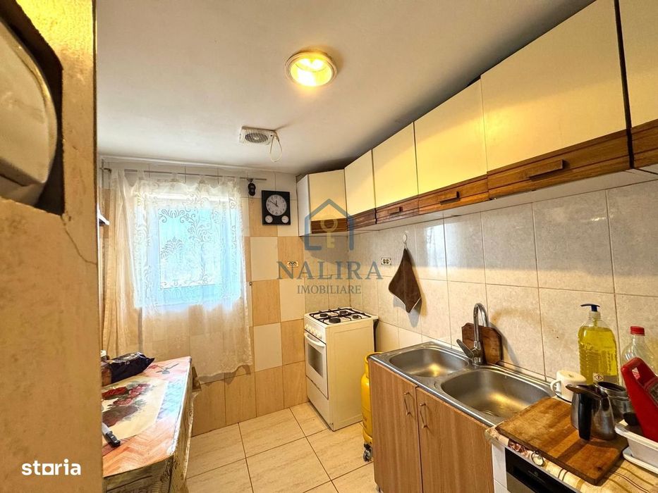 Casa de caramida de vanzare Surdesti cu teren intravilan 5000mp