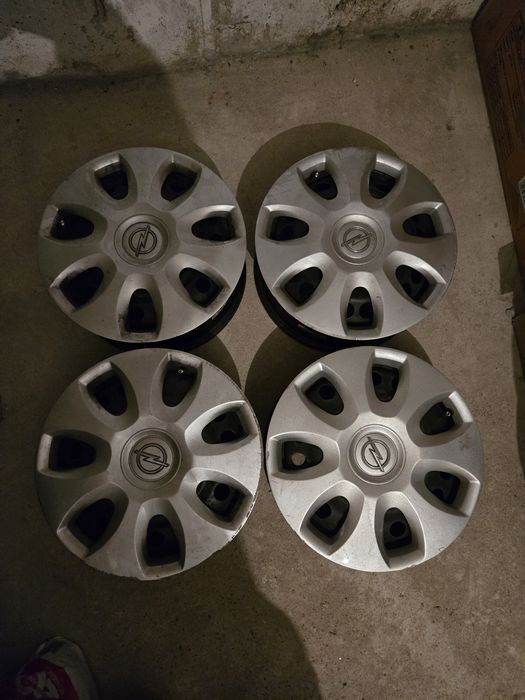 Vand 4 jante tabla 15" cu capace Opel Corsa D 4x100