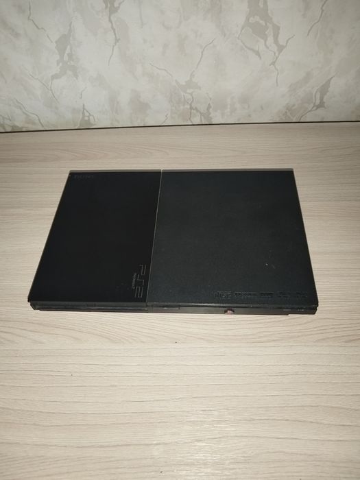 Продам playstation 2 + 64 mb memory card