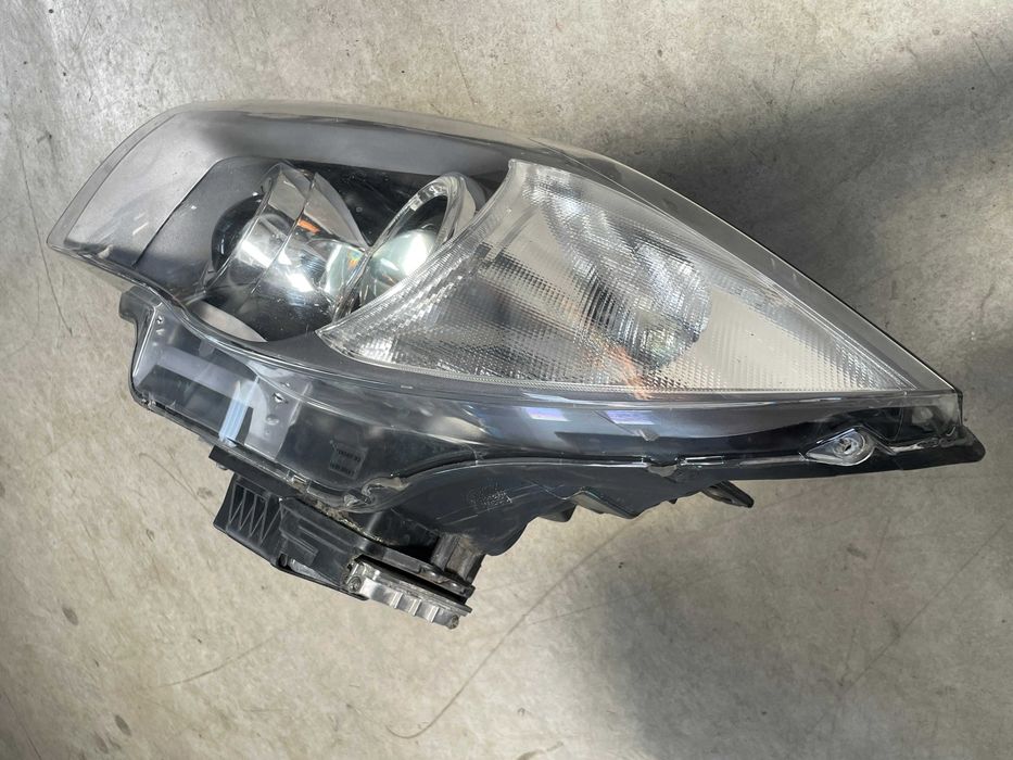 far stanga xenon Bmw seria 1 E81 - E87 LCI facelift