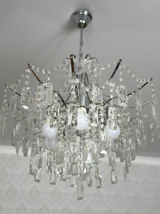 Продам люстру новую