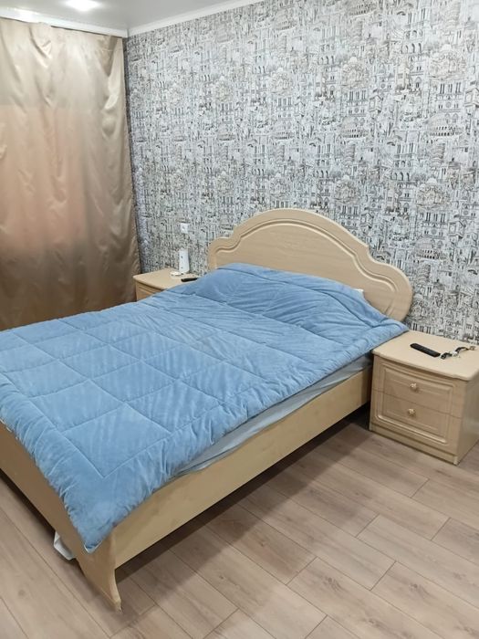 Кровать с тумбочками