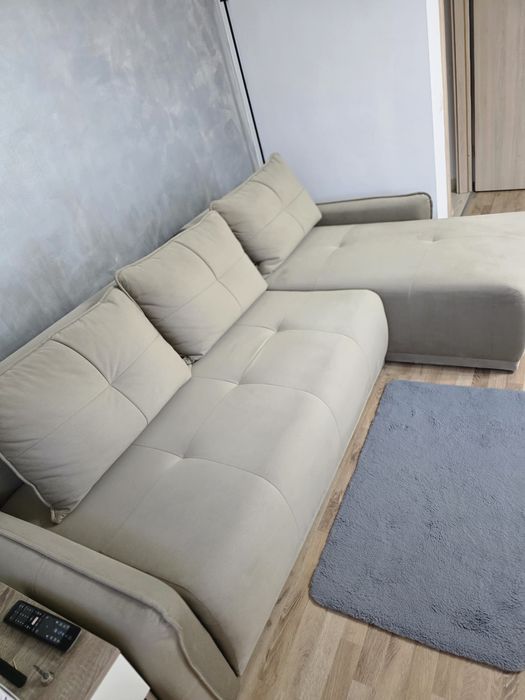 Colțar extensibil cu lada depozitare interschimbabil