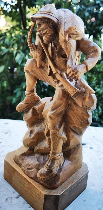 Scluptura lemn vanator