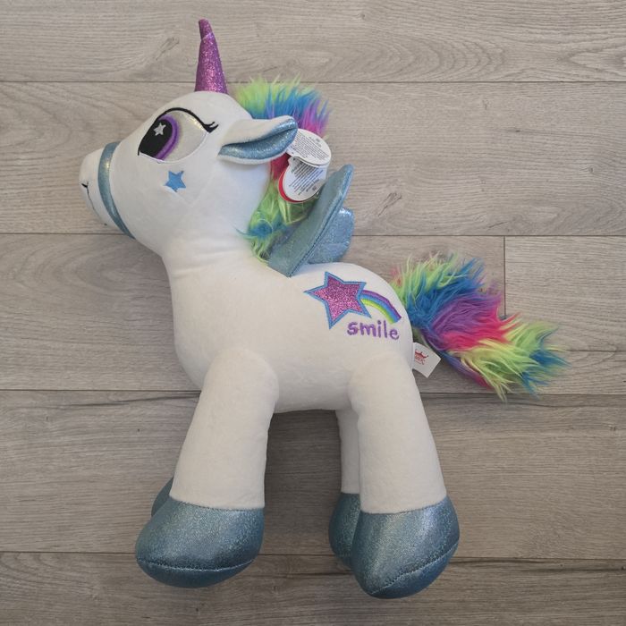 Плюшена играчка еднорог. Нова. 45 см висока.