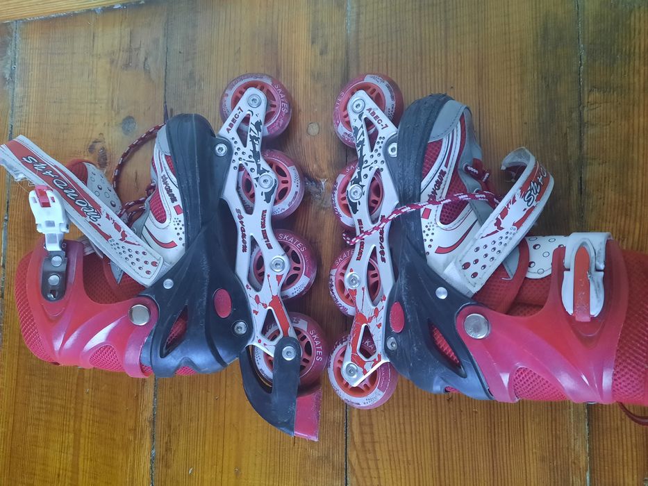 Роликовые коньки