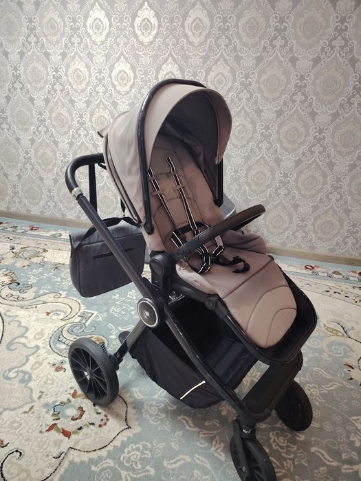 Коляска мен ходунок сатылады