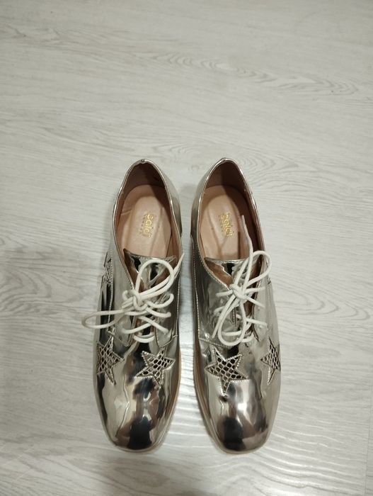 Женские туфли ботинки на платформе серебристого цвета от бренда Baldi