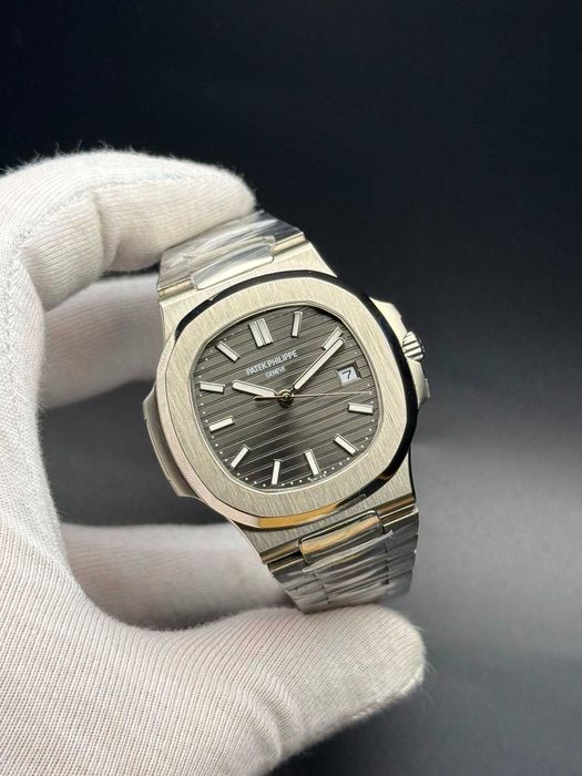 Patek Philippe Nautilus, Stainless Steel, Grey-Blue Ribbed Dial on Integrated Steel Bracelet — 40mm