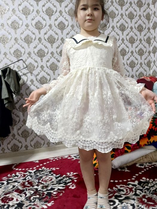 Детский платье россиский ,шикарный.для взрослих тоже есть одежда .100%