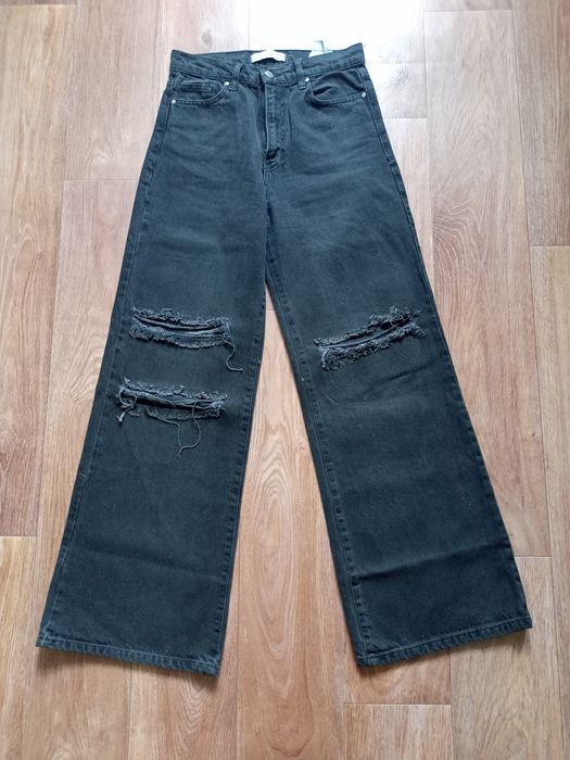 Джинсы рванки,серые
