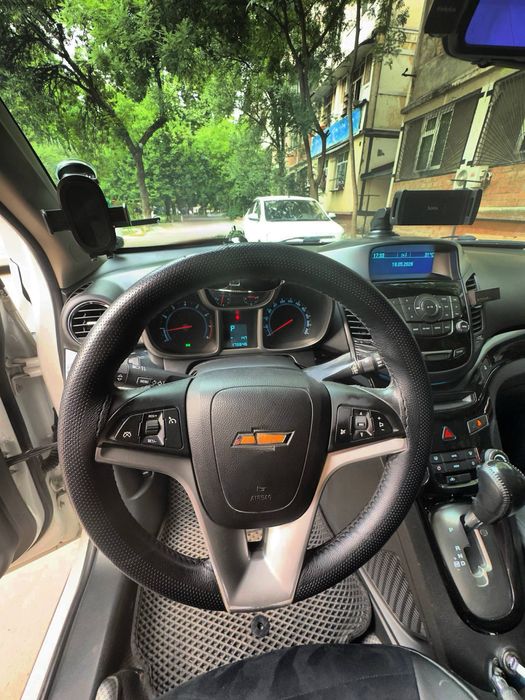 Орландо chevrolet автомат 3позиция в отличном состоянии